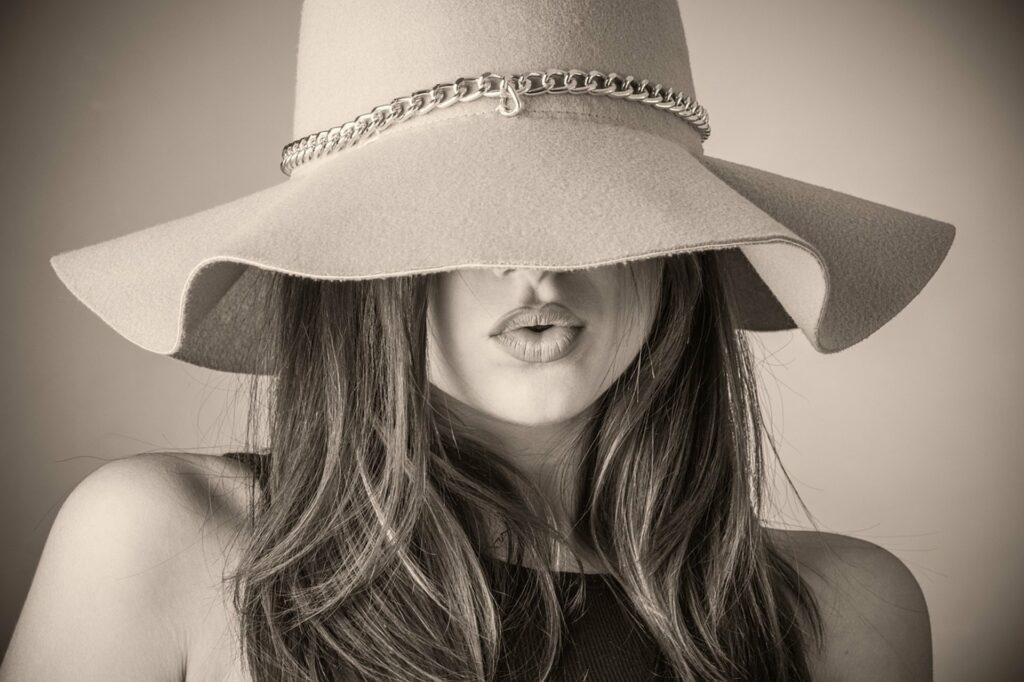 A woman wearing a beautiful hat from Frankly Fabulous A woman wearing a beautiful hat from Frankly Fabulous