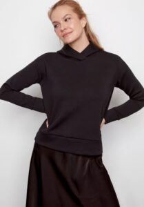 A woman wearing elevated luxe loungewear from I Love Tyler Madison.